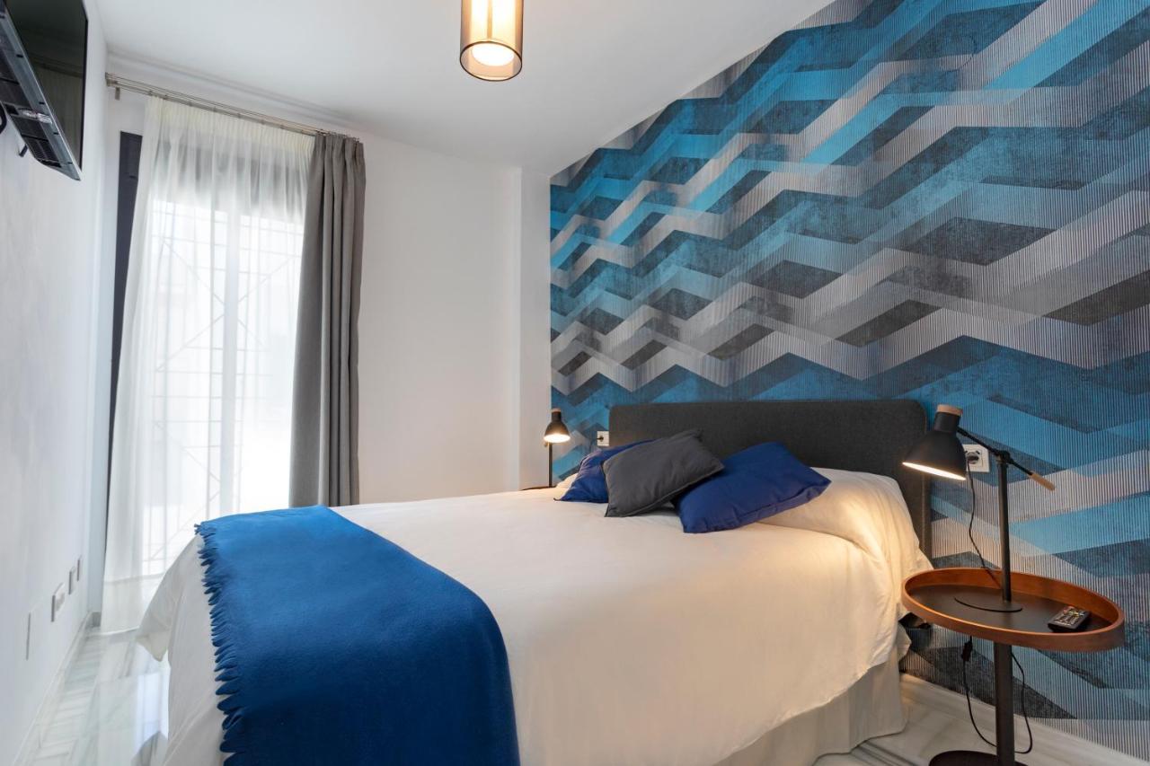 Malaga Rivas 34 Suites Homes Eksteriør billede
